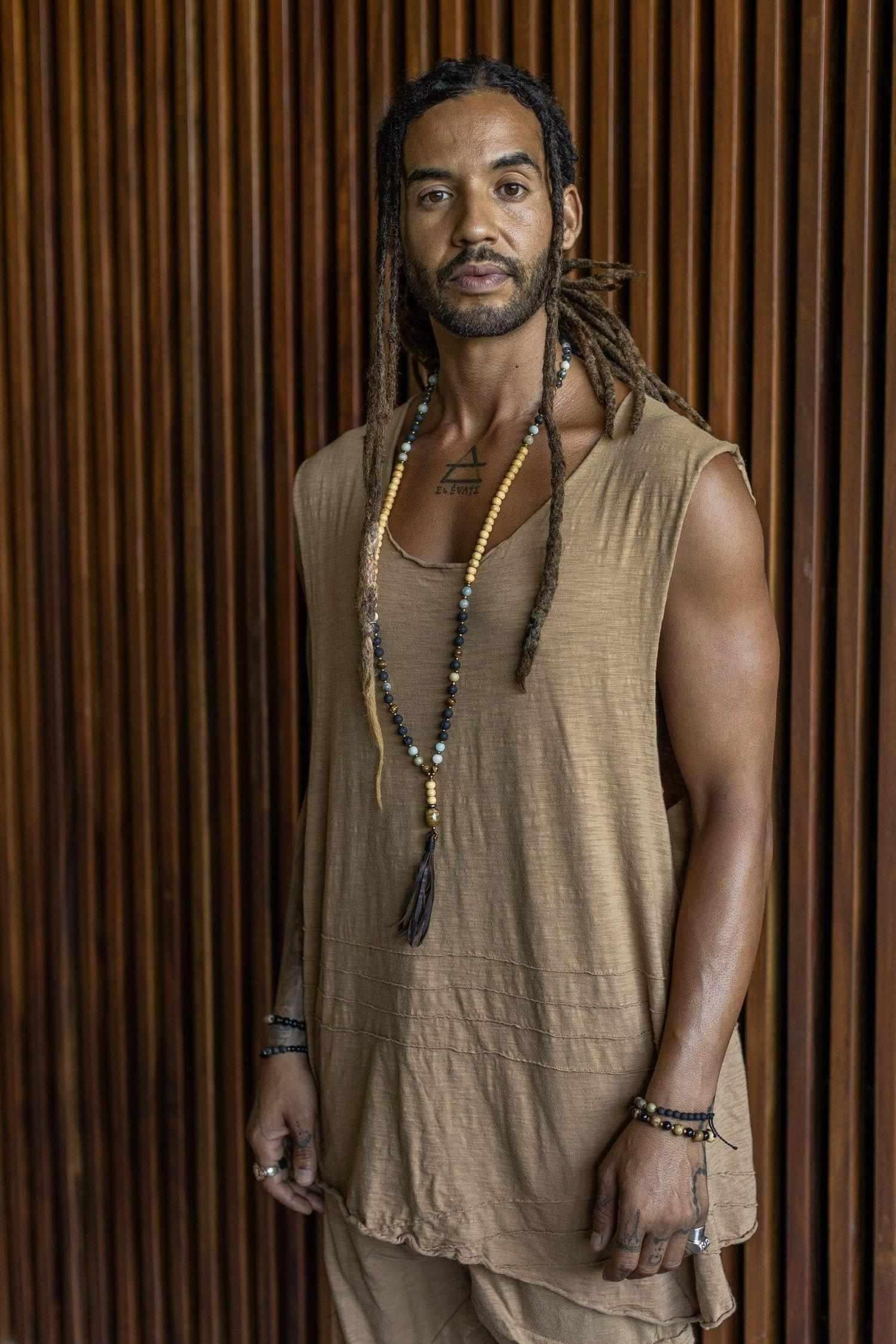 KIVI VEST - A loose fit sleeveless tank top shirt with asymmetric cut and stitch work details - VALO Design Clothing